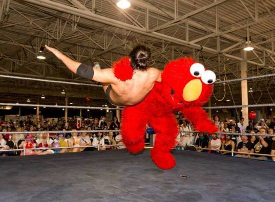 elmo-wrestling-slam-tickle-this-muppet-13753090180